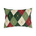 Christmas argyle outdoor lumbar pillow with green, red and cream diamonds and small gold stars