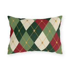 Christmas argyle outdoor lumbar pillow with green, red and cream diamonds and small gold stars