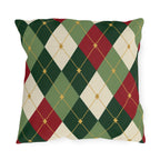 Christmas argyle outdoor pillow with green, red and cream diamonds and small gold stars