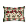 Christmas ornament plaid outdoor lumbar pillow with a vintage holly bauble and red ribbon in a cream panel on green and red tartan