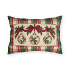 Christmas ornament plaid outdoor lumbar pillow with a vintage holly bauble and red ribbon in a cream panel on green and red tartan