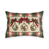 Christmas ornament plaid outdoor lumbar pillow with a vintage holly bauble and red ribbon in a cream panel on green and red tartan