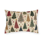 Christmas tree outdoor lumbar pillow with a scatter of red, green, navy and tan Christmas trees and gold stars on cream