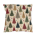 Christmas tree outdoor pillow with a scatter of red, green, navy and tan Christmas trees and gold stars on cream