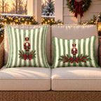 Sage stripe nutcracker outdoor pillow and outdoor lumbar pillow styled together as a set on a wicker loveseat for Christmas