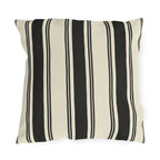 Black and cream ticking stripe outdoor pillow with bold and thin vertical black stripes